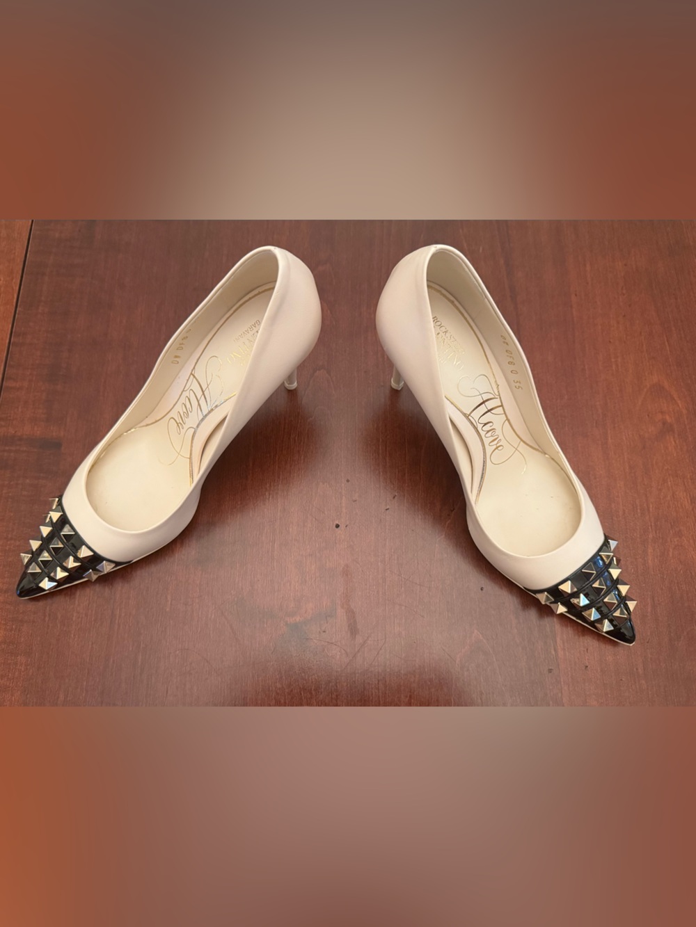 Valentino Garavani Cream Pumps with Black Studded Pointed Toe